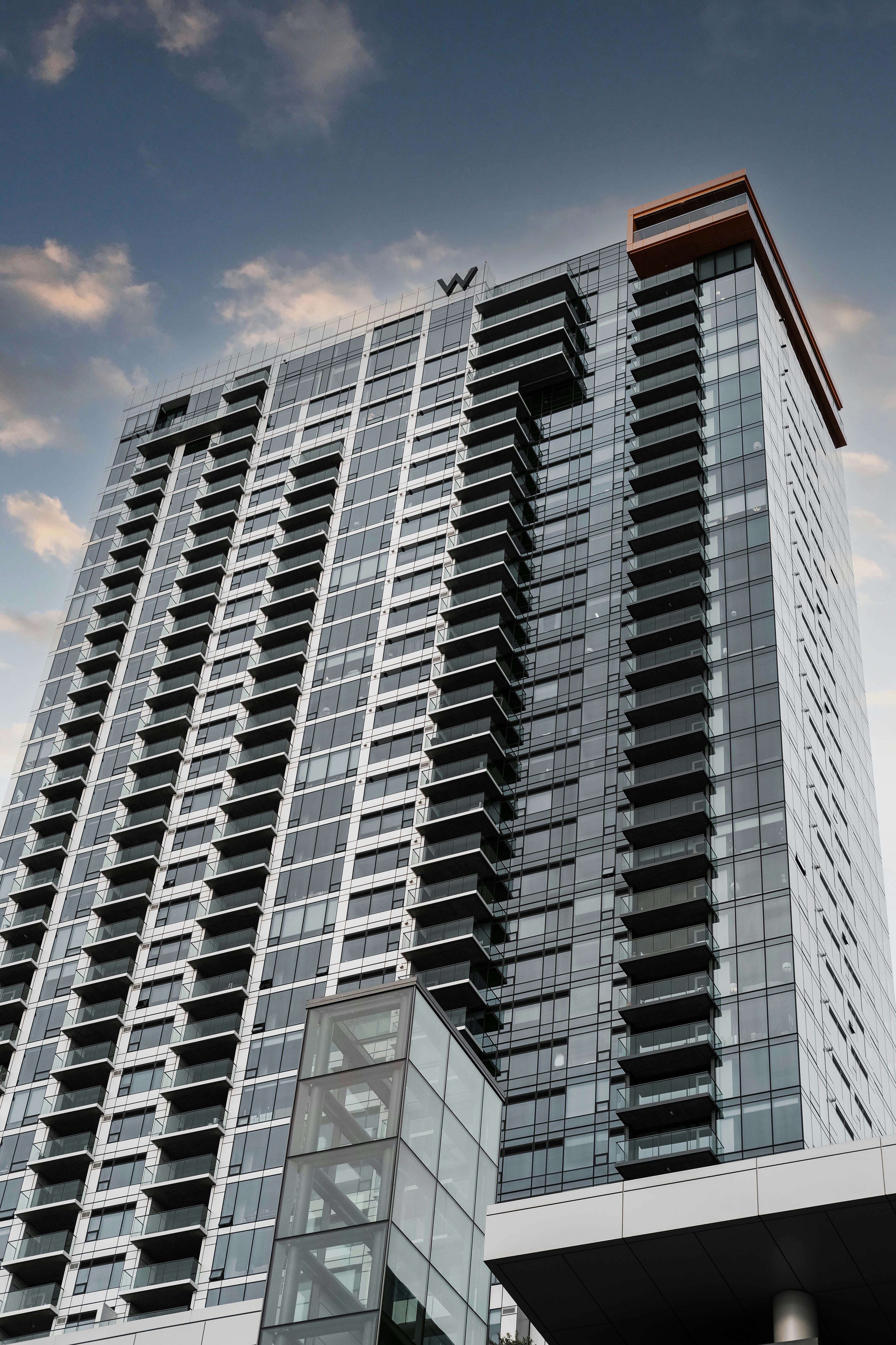 white and black concrete building under blue sky during daytime